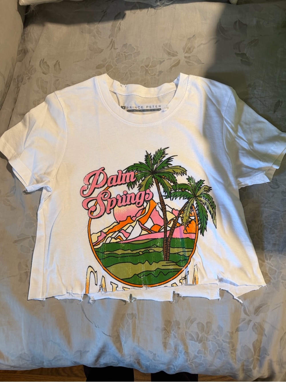 Prince Peter Collection White Tee with Pink Lettering & Green Palm Print